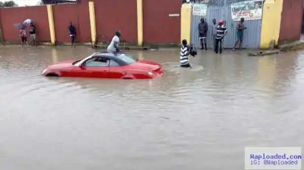 Photos: Car gets stuck in floodwater at Ajah after heavy rainfall